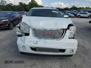 2007 GMC Yukon Denali z VIN 1GKFK63877J383310, wystawiony jako Copart lot #56122105 z przebiegiem 250 797 mil mil oraz Czysty tytuł • Clean title. Historia ofert i sprzedaży dostępna na DreamBid. Obrazek 5.