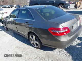 2011 Mercedes-Benz E-Class E 350 Luxury with VIN WDDHF8HB7BA390393, listed as a IAAI auction lot 41398879 with 155,161 mi miles. Bid and sale history available at carsss.com. Image 3.