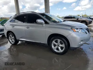2010 Lexus RX 350 with VIN 2T2ZK1BA0AC038280, listed as a Copart auction lot 56547915 with 214,476 mi miles and Clean Title. Bid and sale history available at DreamBid. Image 4.