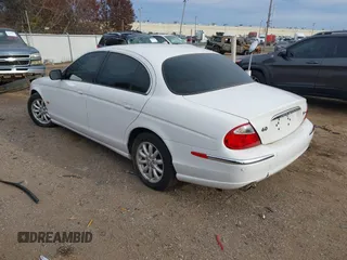 2002 Jaguar S-Type with VIN SAJDA01P12GM35163, listed as a IAAI auction lot 41097415 with 114,017 mi miles and . Bid and sale history available at DreamBid. Image 3.