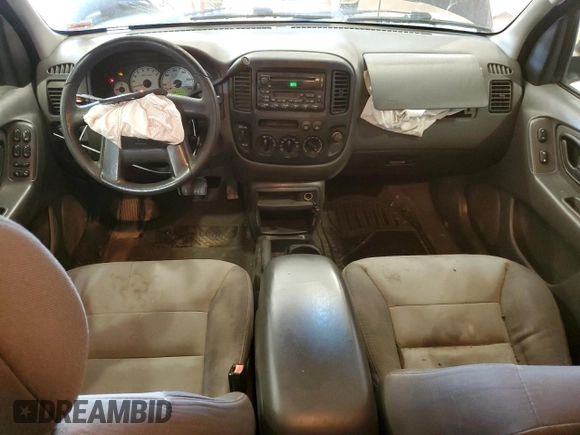 2004 Ford Escape XLS with VIN 1FMYU92154KA14600, listed as a Copart auction lot 83101474 with 305,444 mi miles and Salvage Title. Bid and sale history available at DreamBid. Image 8.