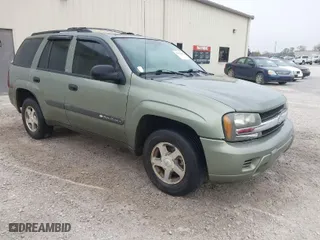 2004 Chevrolet TrailBlazer LT with VIN 1GNDS13S042389058, listed as a IAAI auction lot 41897018 with 141,587 mi miles. Bid and sale history available at carsss.com. Image 1.