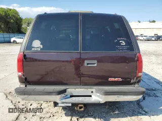 1997 GMC Yukon with VIN 1GKEK13R7VJ711782, listed as a Copart auction lot 74793184 with 208,718 mi miles and Salvage Title. Bid and sale history available at carsss.com. Image 6.