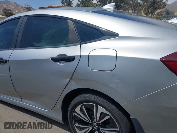 2018 Honda Civic EX-L z VIN JHMFC1F79JX037843, wystawiony jako IAAI lot #42121623 z przebiegiem 49 759 mil mil oraz . Historia ofert i sprzedaży dostępna na DreamBid. Obrazek 6.