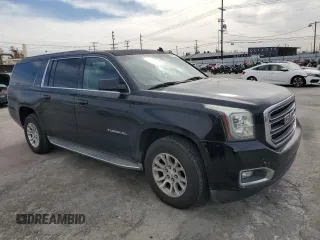 2015 GMC Yukon XL SLT with VIN 1GKS1HKC5FR218505, listed as a Copart auction lot 45708575 with 220,914 mi miles and Clean Title. Bid and sale history available at carsss.com. Image 4.