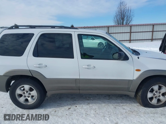 2003 Mazda Tribute ES with VIN 4F2CZ96133KM22960, listed as a IAAI auction lot 41550181 with 159,412 mi miles. Bid and sale history available at carsss.com. Image 14.