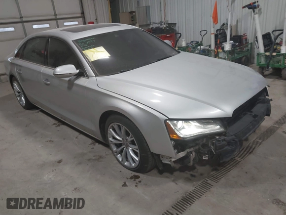 2011 Audi A8 with VIN WAURVAFD5BN014214, listed as a IAAI auction lot 41396044 with 131,764 mi miles and . Bid and sale history available at DreamBid. Image 1.