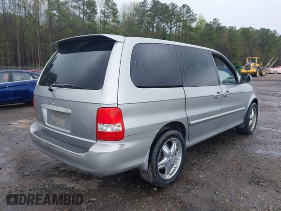2004 Kia Sedona LX with VIN KNDUP131246567448, listed as a IAAI auction lot 41842992 with 231,424 mi miles. Bid and sale history available at carsss.com. Image 4.
