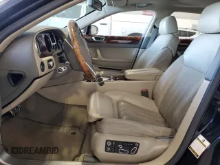 2006 Bentley Flying Spur z VIN SCBBR53W06C037412, wystawiony jako Copart lot #50492605 z przebiegiem 59 005 mil mil oraz Szkody całkowita. Historia ofert i sprzedaży dostępna na DreamBid. Obrazek 7.