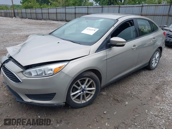 2016 Ford Focus SE z VIN 1FADP3F26GL368544, wystawiony jako IAAI lot #42322376 z przebiegiem 120 535 mil mil oraz . Historia ofert i sprzedaży dostępna na DreamBid. Obrazek 2.