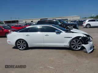 2012 Jaguar XJ XJL with VIN SAJWA2GB3CLV38500, listed as a IAAI auction lot 41990409 with 73,793 mi miles and . Bid and sale history available at DreamBid. Image 13.