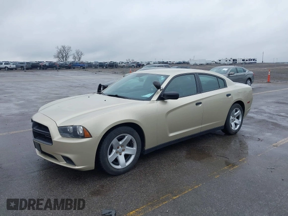 2013 Dodge Charger Police with VIN 2C3CDXAT9DH692946, listed as a IAAI auction lot 42115225 with 107,086 mi miles. Bid and sale history available at carsss.com. Image 2.
