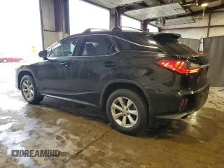 2016 Lexus RX 350 with VIN 2T2BZMCA3GC001679, listed as a Copart auction lot 57070835 with 74,729 mi miles and Salvage Title. Bid and sale history available at DreamBid. Image 2.