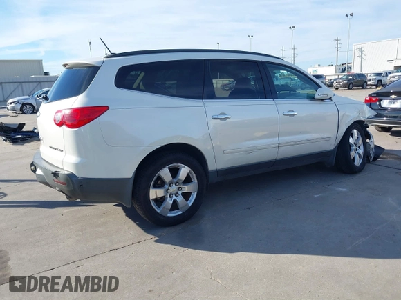 2012 Chevrolet Traverse LTZ z VIN 1GNKRLED8CJ326842, wystawiony jako IAAI lot #41003133 z przebiegiem 201 099 mil mil oraz . Historia ofert i sprzedaży dostępna na DreamBid. Obrazek 4.