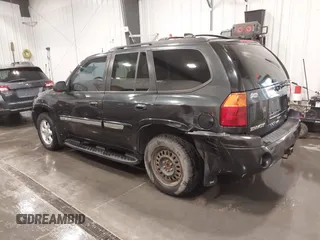 2005 GMC Envoy SLT z VIN 1GKDT13S852281122, wystawiony jako IAAI lot #42292577 z przebiegiem 156 052 mil mil oraz . Historia ofert i sprzedaży dostępna na DreamBid. Obrazek 3.