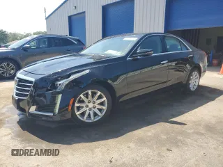 2015 Cadillac CTS Luxury AWD with VIN 1G6AX5SX0F0105415, listed as a Copart auction lot 62143995 with 72,614 mi miles and Salvage title. Bid and sale history available at DreamBid. Image 1.