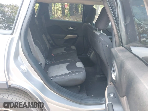 2017 Jeep Cherokee Sport with VIN 1C4PJLAB5HW596468, listed as a IAAI auction lot 42640784 with 115,553 mi miles and . Bid and sale history available at DreamBid. Image 8.