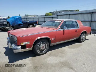1981 Cadillac Eldorado z VIN 1G6AL5799BE630301, wystawiony jako Copart lot #55995155 z przebiegiem 49 072 mil mil oraz Tytuł czysty. Historia ofert i sprzedaży dostępna na DreamBid. Obrazek 1.
