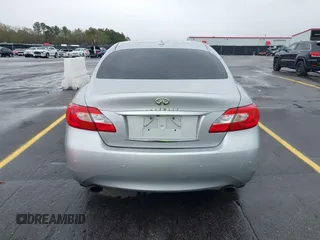 2013 Infiniti M with VIN JN1BY1AP4DM513899, listed as a IAAI auction lot 41854573 with 202,480 mi miles and . Bid and sale history available at carsss.com. Image 16.