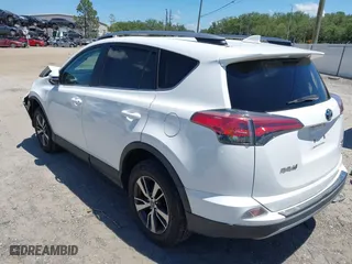 2017 Toyota RAV4 XLE with VIN 2T3RFREV1HW683851, listed as a IAAI auction lot 42051722 with 98,307 mi miles. Bid and sale history available at carsss.com. Image 3.