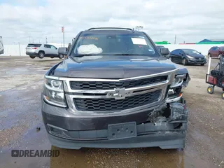 2015 Chevrolet Tahoe LT with VIN 1GNSCBKC2FR632173, listed as a IAAI auction lot 42135105 with 150,033 mi miles and . Bid and sale history available at DreamBid. Image 12.