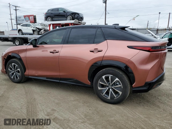 2024 Lexus RZ 450e Premium with VIN JTJAAAAB0RA024522, listed as a Copart auction lot 53356995 with 885 mi miles and Salvage title. Bid and sale history available at DreamBid. Image 2.