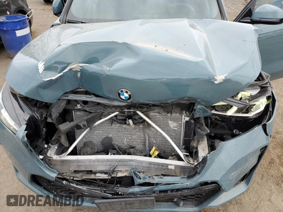 2023 BMW X1 xDrive28i with VIN WBX73EF02P5W11223, listed as a Copart auction lot 49205155 with 17,083 mi miles and Salvage Title. Bid and sale history available at DreamBid. Image 12.