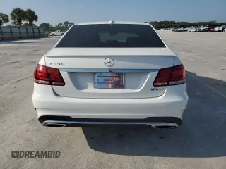2014 Mercedes-Benz E 350 Sport with VIN WDDHF5KB5EA967675, listed as a Copart auction lot 52763995 with 68,902 mi miles and Salvage title. Bid and sale history available at DreamBid. Image 6.