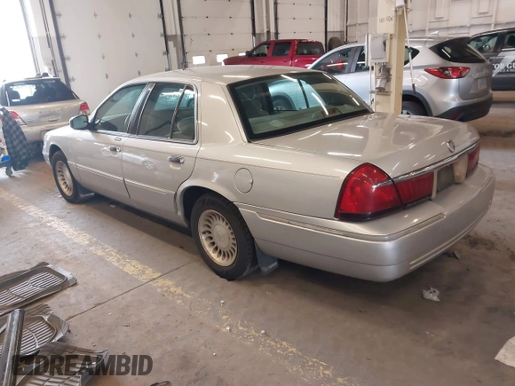 2000 Mercury Grand Marquis LS z VIN 2MEFM75W0YX736324, wystawiony jako IAAI lot #41865927 z przebiegiem 136 886 mil mil oraz . Historia ofert i sprzedaży dostępna na DreamBid. Obrazek 3.
