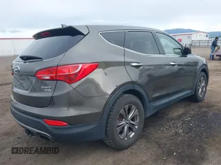 2014 Hyundai Santa Fe z VIN 5XYZTDLB1EG144290, wystawiony jako IAAI lot #42126367 z przebiegiem 138 525 mil mil oraz . Historia ofert i sprzedaży dostępna na DreamBid. Obrazek 4.