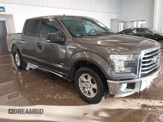 2015 Ford F-150 XL with VIN 1FTEW1CG2FKE36882, listed as a IAAI auction lot 41364096 with 143,167 mi miles. Bid and sale history available at carsss.com. Image 1.