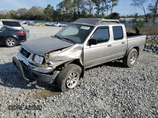 2000 Nissan Frontier XE with VIN 1N6ED27T8YC393355, listed as a Copart auction lot 49607575 with 241,813 mi miles and Salvage title. Bid and sale history available at DreamBid. Image 1.