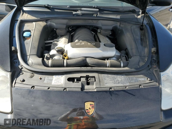 2005 Porsche Cayenne S with VIN WP1AB29PX5LA61015, listed as a Copart auction lot 76097734 with 106,331 mi miles and Salvage Title. Bid and sale history available at carsss.com. Image 12.