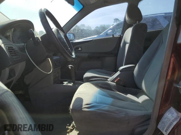 2003 Mazda Protege DX with VIN JM1BJ225030144551, listed as a Copart auction lot 50769905 with 179,876 mi miles and Salvage Title. Bid and sale history available at DreamBid. Image 7.