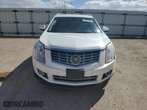 2014 Cadillac SRX Premium Collection z VIN 3GYFNGE32ES573872, wystawiony jako Copart lot #49871955 z przebiegiem 119 362 mil mil oraz Szkody całkowita. Historia ofert i sprzedaży dostępna na DreamBid. Obrazek 5.
