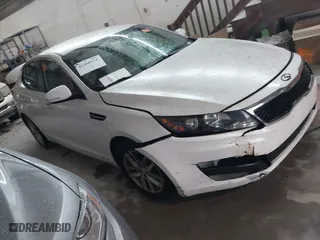 2013 Kia Optima LX with VIN KNAGM4A77D5400536, listed as a IAAI auction lot 41460372 with 84,560 mi miles. Bid and sale history available at carsss.com. Image 1.