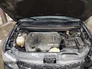 2015 Dodge Journey Crossroad with VIN 3C4PDCGG8FT740981, listed as a IAAI auction lot 41582710 with 185,938 mi miles and . Bid and sale history available at DreamBid. Image 10.