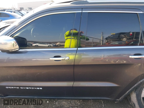 2014 Jeep Grand Cherokee Limited with VIN 1C4RJEBGXEC499052, listed as a IAAI auction lot 41665838 with 160,473 mi miles. Bid and sale history available at carsss.com. Image 14.