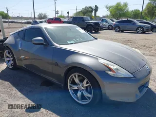 2012 Nissan 370Z z VIN JN1AZ4EH6CM561397, wystawiony jako IAAI lot #41812673 z przebiegiem 53 861 mil mil oraz . Historia ofert i sprzedaży dostępna na DreamBid. Obrazek 1.