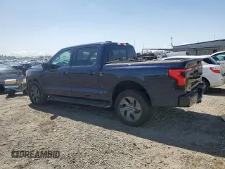 2023 Ford F-150 Lightning Pro with VIN 1FT6W1EV0PWG28960, listed as a Copart auction lot 51858855 with Not Provided miles and Non Repairable. Bid and sale history available at DreamBid. Image 2.