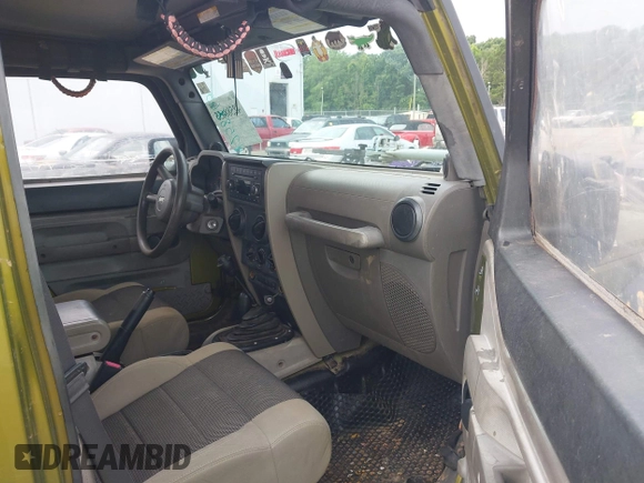 2007 Jeep Wrangler Unlimited X with VIN 1J4GA39177L164566, listed as a IAAI auction lot 42588655 with 50,915 mi miles and . Bid and sale history available at DreamBid. Image 5.