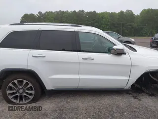 2018 Jeep Grand Cherokee Limited with VIN 1C4RJFBG8JC245999, listed as a IAAI auction lot 42345499 with 90,670 mi miles and . Bid and sale history available at DreamBid. Image 13.