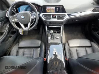 2019 BMW 3 Series 330i with VIN WBA5R1C55KAJ98853, listed as a Copart auction lot 50699315 with 101,110 mi miles and Salvage title. Bid and sale history available at DreamBid. Image 8.