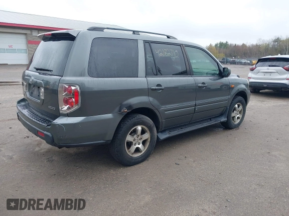 2007 Honda Pilot EX-L with VIN 2HKYF18667H526601, listed as a IAAI auction lot 42182710 with 221,948 mi miles and . Bid and sale history available at carsss.com. Image 4.