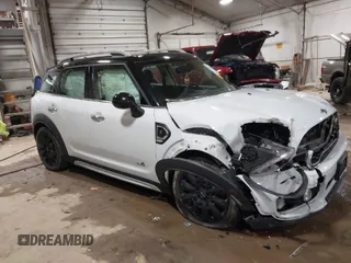 2017 MINI Countryman Cooper S z VIN WMZYT5C36H3D80567, wystawiony jako IAAI lot #41236704 z przebiegiem 80 475 mil mil oraz . Historia ofert i sprzedaży dostępna na DreamBid. Obrazek 1.