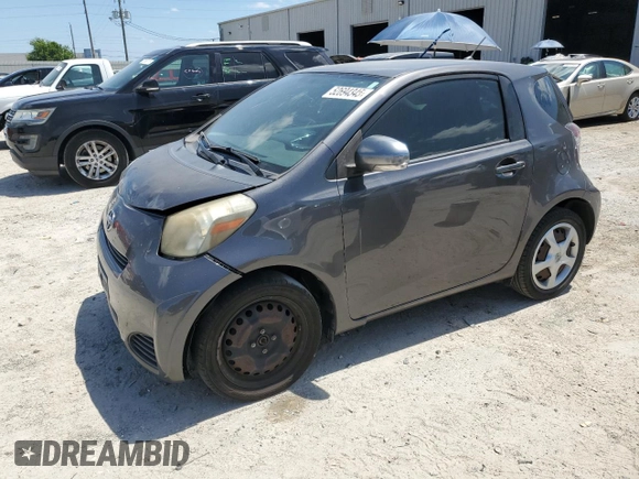 2012 Scion iQ with VIN JTNJJXB06CJ011117, listed as a Copart auction lot 52694345 with 94,547 mi miles and Salvage Title. Bid and sale history available at carsss.com. Image 1.