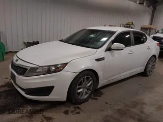 2011 Kia Optima LX with VIN KNAGM4A7XB5121112, listed as a IAAI auction lot 41384717 with 140,821 mi miles and . Bid and sale history available at carsss.com. Image 2.