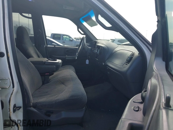 2001 Ford F-150 XLT with VIN 1FTRW07L81KE91672, listed as a IAAI auction lot 42021661 with 200,000 mi miles and . Bid and sale history available at DreamBid. Image 5.