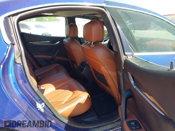 2015 Maserati Ghibli S Q4 with VIN ZAM57RTA1F1144312, listed as a IAAI auction lot 42336740 with 64,897 mi miles and . Bid and sale history available at DreamBid. Image 8.