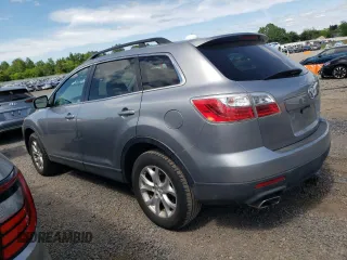 2011 Mazda CX-9 Touring z VIN JM3TB3CV3B0323789, wystawiony jako Copart lot #57762505 z przebiegiem 151 942 mil mil oraz Czysty tytuł • Clean title. Historia ofert i sprzedaży dostępna na DreamBid. Obrazek 2.